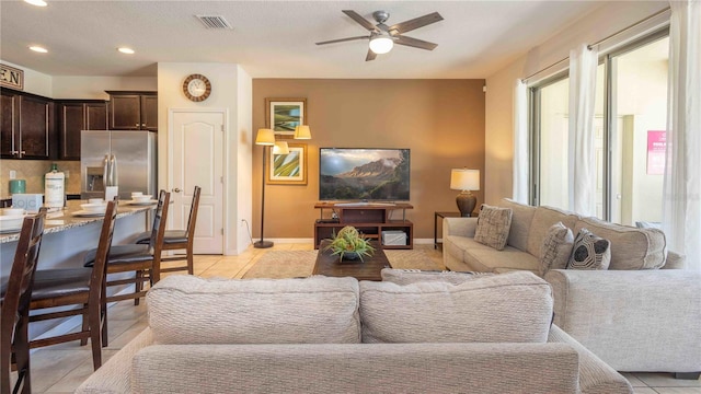 2030 Majorca Dr, Kissimmee, FL 34747 - living area featuring ceiling fan, light tile patterned floors, recessed lighting, and baseboards