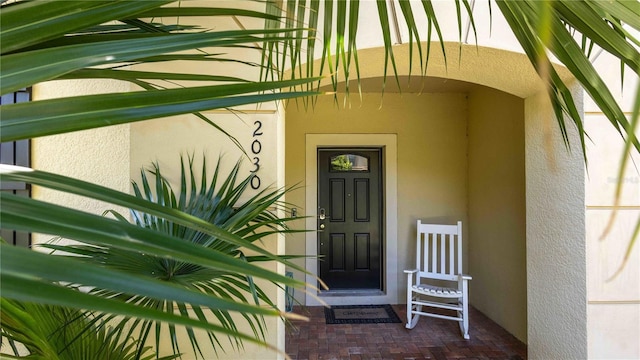 2030 Majorca Dr, Kissimmee, FL 34747 - view of exterior entry featuring stucco siding