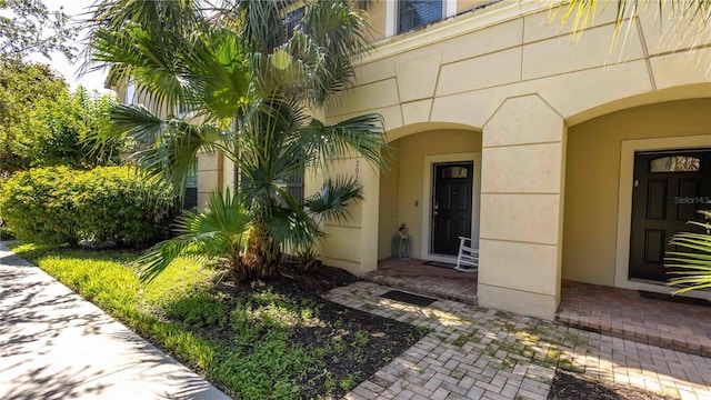 2030 Majorca Dr, Kissimmee, FL 34747 - doorway to property featuring stucco siding