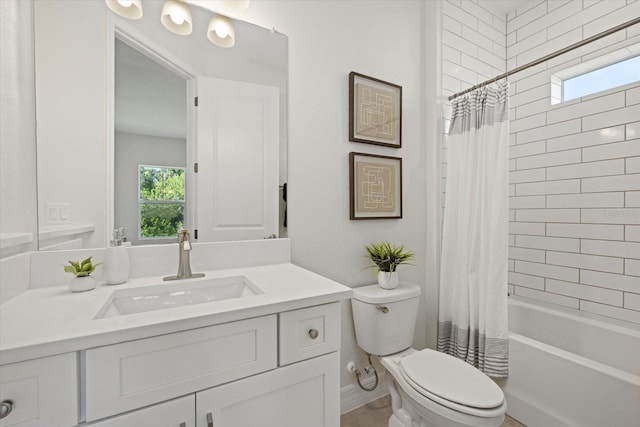 bathroom with toilet, vanity, and shower / bath combination with curtain