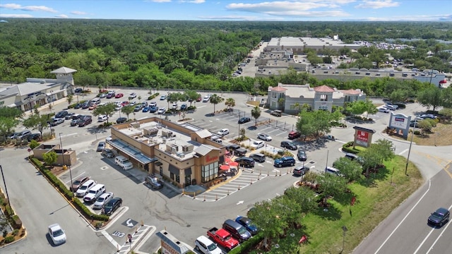drone / aerial view of a heavily wooded area
