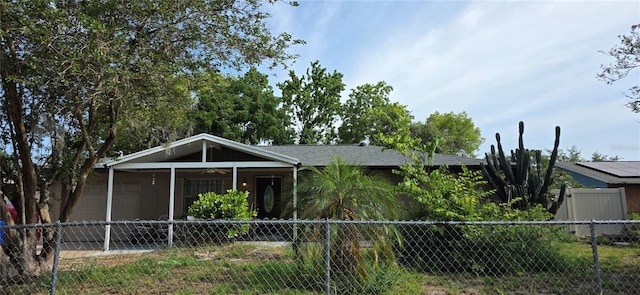 single story home with covered porch and ceiling fan