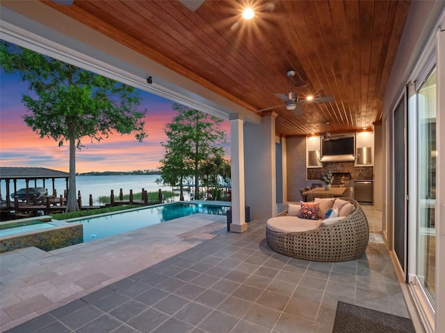 9916 Lone Tree Ln, Orlando, FL 32836 - view of patio / terrace with area for grilling, ceiling fan, and a pool with connected hot tub