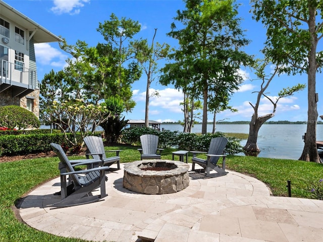 9916 Lone Tree Ln, Orlando, FL 32836 - view of patio featuring a fire pit and a water view
