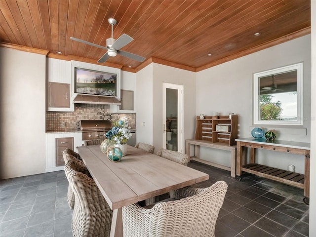 9916 Lone Tree Ln, Orlando, FL 32836 - dining space featuring wooden ceiling, dark tile patterned floors, ornamental molding, and a ceiling fan