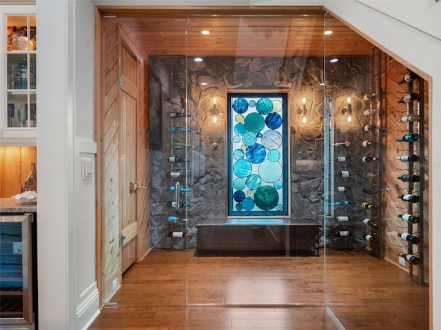 9916 Lone Tree Ln, Orlando, FL 32836 - wine area featuring beverage cooler and hardwood / wood-style flooring