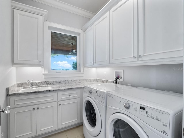 9916 Lone Tree Ln, Orlando, FL 32836 - washroom with cabinet space, washing machine and dryer, and crown molding