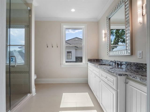 9916 Lone Tree Ln, Orlando, FL 32836 - full bathroom featuring vanity, ornamental molding, toilet, a stall shower, and baseboards