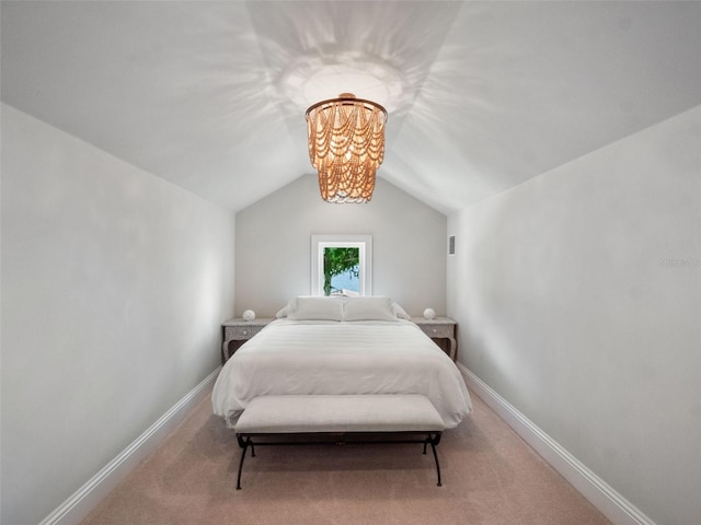 9916 Lone Tree Ln, Orlando, FL 32836 - bedroom with a chandelier, carpet floors, vaulted ceiling, and baseboards