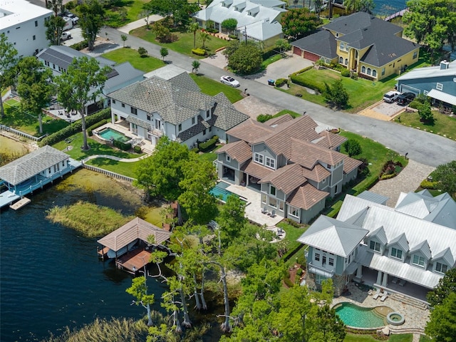 9916 Lone Tree Ln, Orlando, FL 32836 - aerial perspective of suburban area featuring a pool area and a nearby body of water
