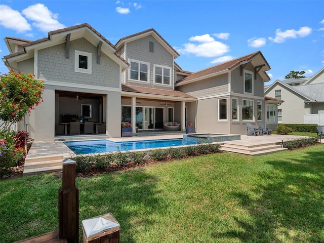 9916 Lone Tree Ln, Orlando, FL 32836 - rear view of property with a ceiling fan, an outdoor pool, an outdoor living space, and a yard