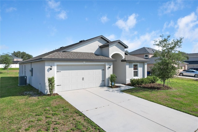 1119 Union Ave, Mascotte, FL 34753 - ranch-style home with stucco siding, an attached garage, a front yard, and driveway