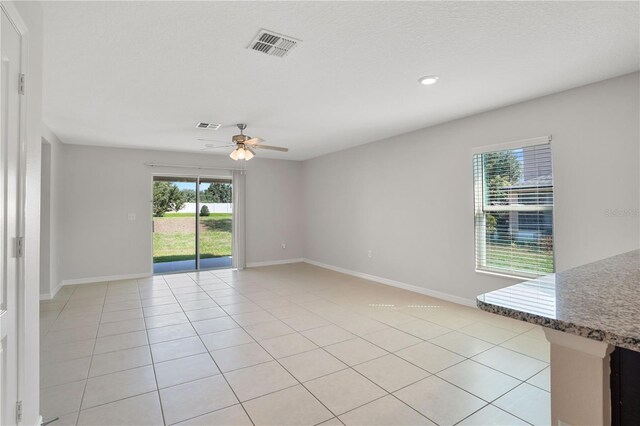 1119 Union Ave, Mascotte, FL 34753 - unfurnished room with light tile patterned flooring, a ceiling fan, baseboards, and recessed lighting