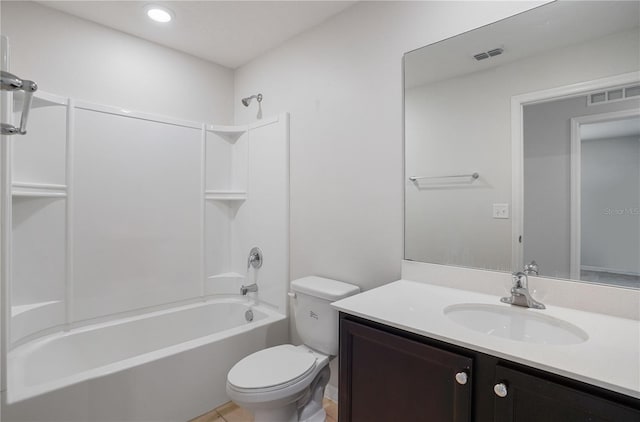 1119 Union Ave, Mascotte, FL 34753 - full bathroom featuring toilet, tub / shower combination, vanity, recessed lighting, and tile patterned floors