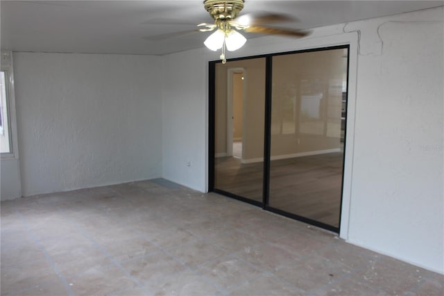 unfurnished room featuring ceiling fan