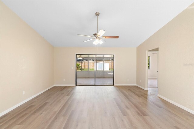 1550 Maxwell Ln, Deltona, FL 32738 - spare room featuring a ceiling fan, light wood finished floors, baseboards, and lofted ceiling