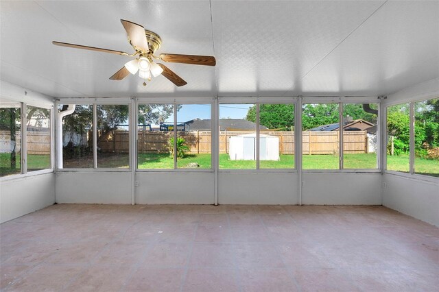 1550 Maxwell Ln, Deltona, FL 32738 - unfurnished sunroom featuring a ceiling fan