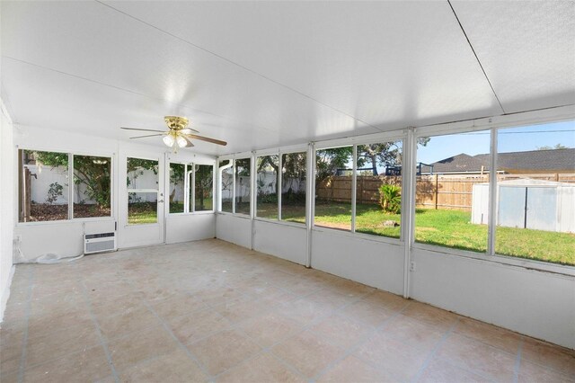 1550 Maxwell Ln, Deltona, FL 32738 - unfurnished sunroom with ceiling fan and an AC wall unit