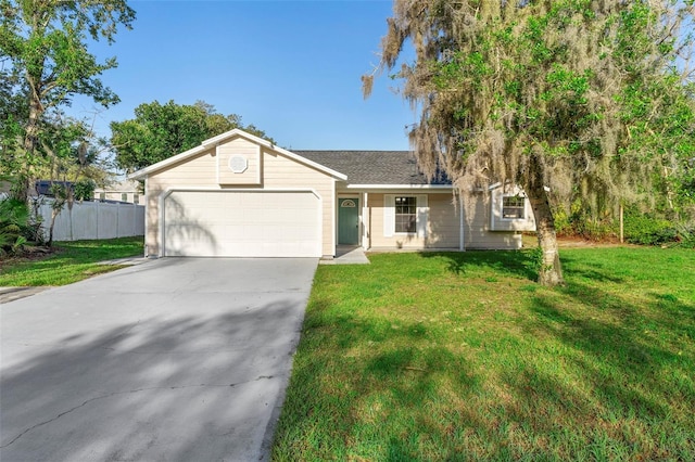 1550 Maxwell Ln, Deltona, FL 32738 - ranch-style house with an attached garage and concrete driveway