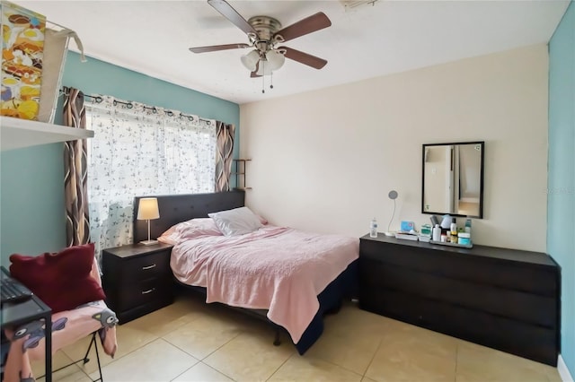 bedroom with light tile patterned floors and ceiling fan