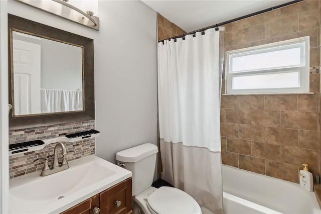 bathroom with tasteful backsplash, toilet, shower / tub combo with curtain, and vanity
