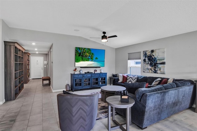 208 Summerlin Ln, Haines City, FL 33844 - living room with lofted ceiling, a ceiling fan, baseboards, and light tile patterned flooring