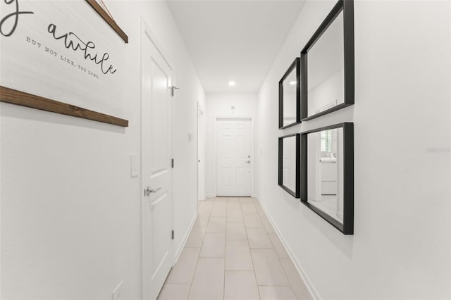 6834 Wilson Hammock Ave, Groveland, FL 34736 - hallway with recessed lighting, light tile patterned floors, and baseboards