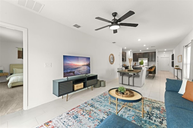6834 Wilson Hammock Ave, Groveland, FL 34736 - living area featuring a ceiling fan, light tile patterned floors, and recessed lighting