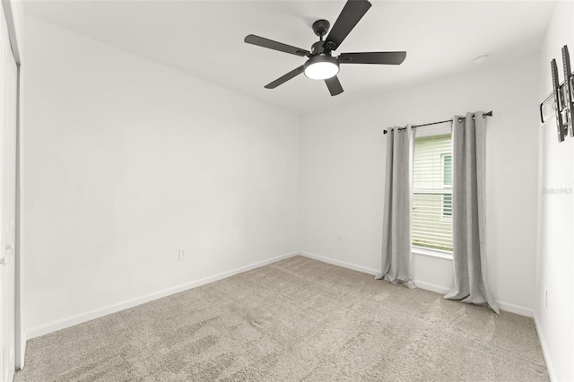 6834 Wilson Hammock Ave, Groveland, FL 34736 - carpeted spare room with baseboards and a ceiling fan