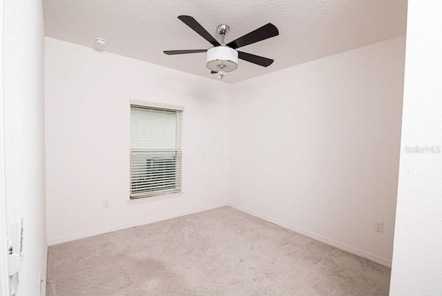 145 Palazzo Ln, Kissimmee, FL 34759 - unfurnished room with carpet flooring, ceiling fan, a textured ceiling, and a smoke detector