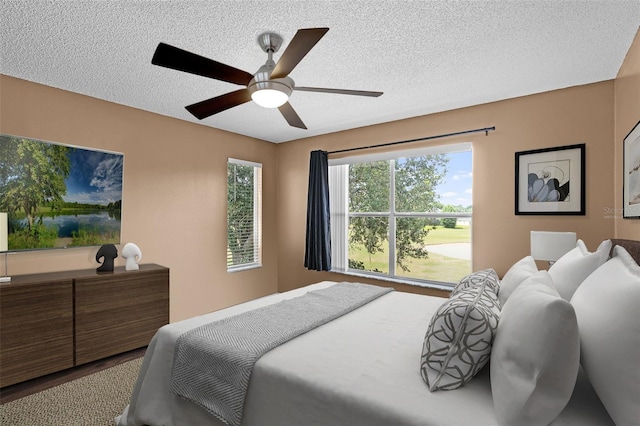 2498 Saint Augustine Blvd, Haines City, FL 33844 - bedroom featuring a textured ceiling and ceiling fan