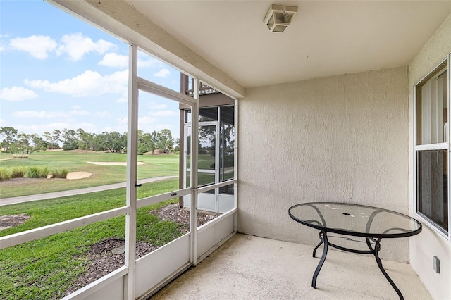2498 Saint Augustine Blvd, Haines City, FL 33844 - unfurnished sunroom featuring golf course view
