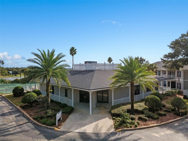 2498 Saint Augustine Blvd, Haines City, FL 33844 - view of front of house with driveway, stucco siding, and fence