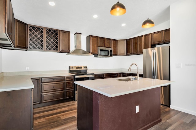 1040 20th St, Orlando, FL 32805 - kitchen featuring wall chimney exhaust hood, a sink, appliances with stainless steel finishes, dark wood finished floors, and dark brown cabinetry