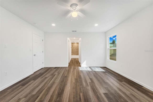 1040 20th St, Orlando, FL 32805 - spare room with dark wood-style floors, ceiling fan, baseboards, and recessed lighting