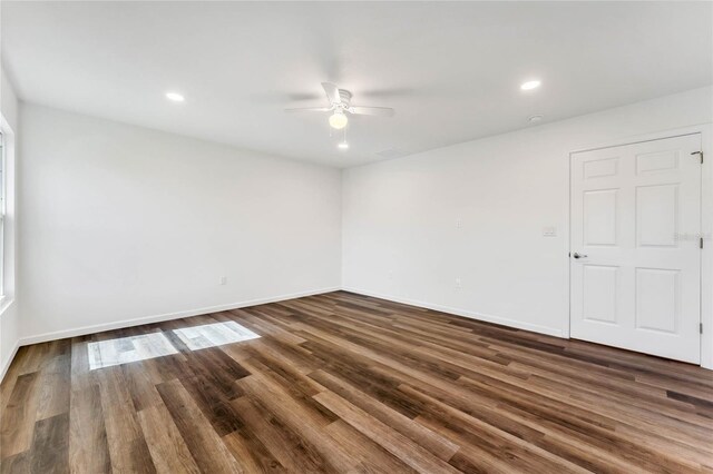 1040 20th St, Orlando, FL 32805 - empty room featuring a ceiling fan, dark wood finished floors, baseboards, and recessed lighting