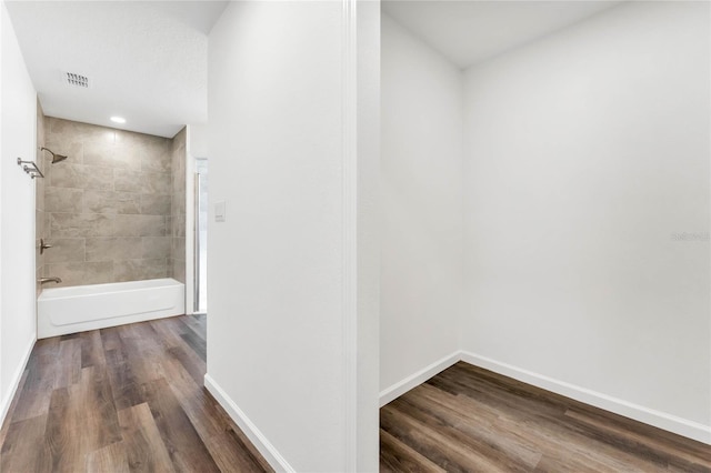 1040 20th St, Orlando, FL 32805 - hall featuring wood finished floors and baseboards
