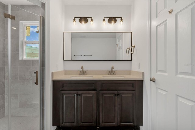 1040 20th St, Orlando, FL 32805 - bathroom with a shower stall and double vanity