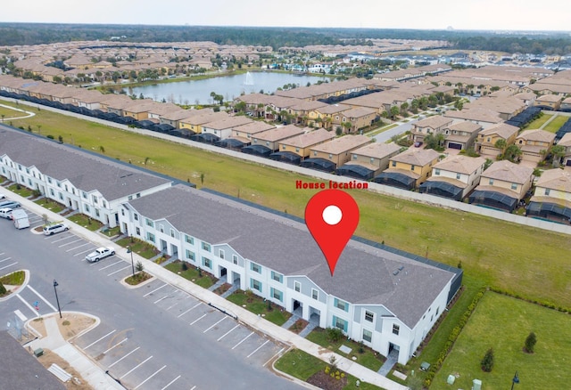 8944 Sydney Ave, Kissimmee, FL 34747 - aerial perspective of suburban area featuring a large body of water