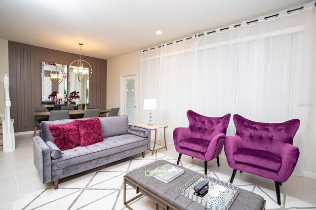 8944 Sydney Ave, Kissimmee, FL 34747 - living area featuring a chandelier, baseboards, light tile patterned floors, and recessed lighting