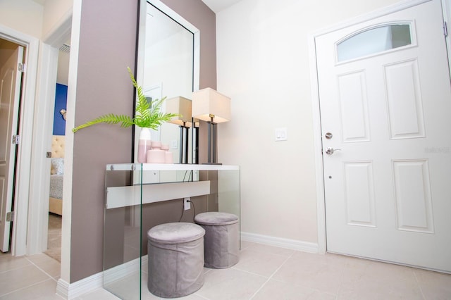 8944 Sydney Ave, Kissimmee, FL 34747 - entrance foyer with tile patterned flooring and baseboards