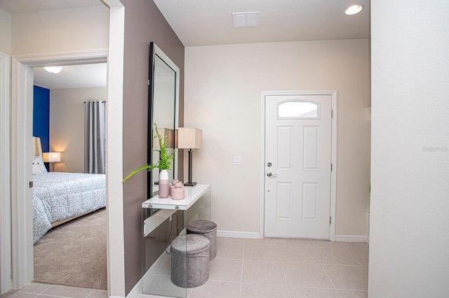 8944 Sydney Ave, Kissimmee, FL 34747 - entrance foyer with light tile patterned floors and baseboards