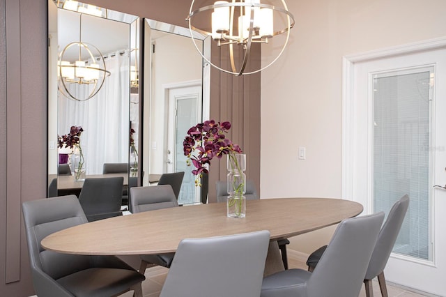 8944 Sydney Ave, Kissimmee, FL 34747 - dining room with a chandelier and baseboards