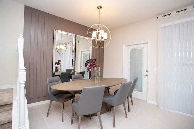 8944 Sydney Ave, Kissimmee, FL 34747 - dining space with a chandelier, light tile patterned floors, and baseboards