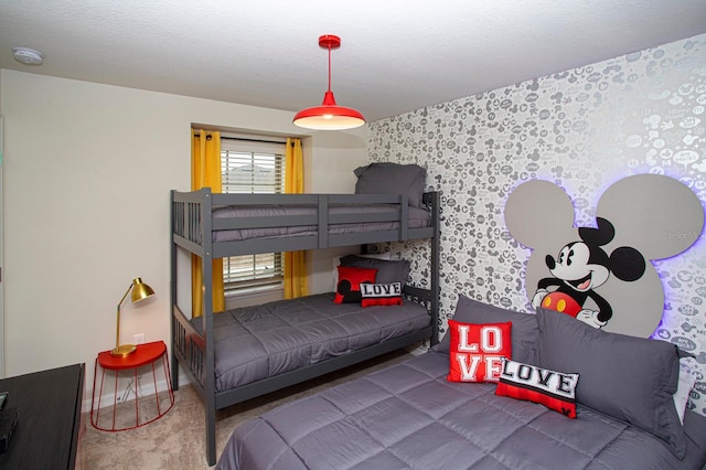 8944 Sydney Ave, Kissimmee, FL 34747 - carpeted bedroom with wallpapered walls and baseboards