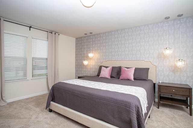 8944 Sydney Ave, Kissimmee, FL 34747 - bedroom featuring wallpapered walls, carpet floors, and baseboards