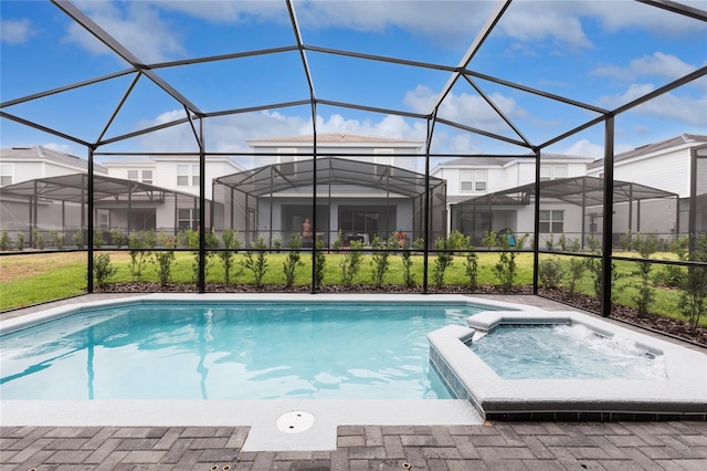 view of swimming pool featuring a pool with connected hot tub
