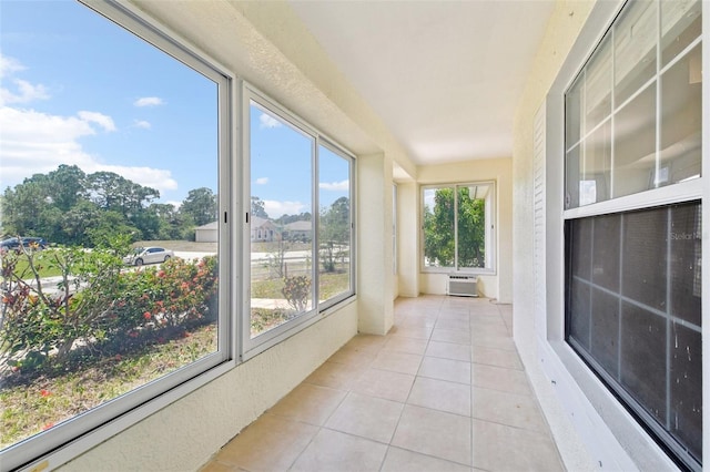 497 Lafayette St SW, Palm Bay, FL 32908 - unfurnished sunroom with tile patterned floors and an AC wall unit