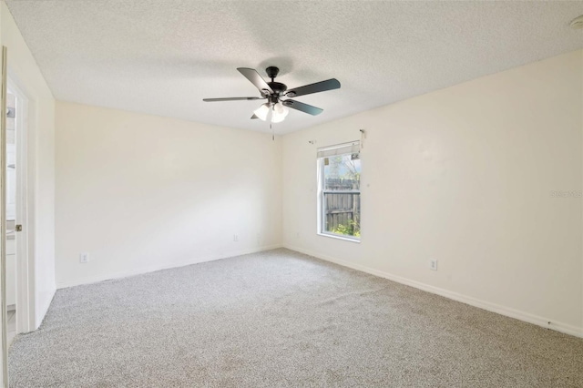 497 Lafayette St SW, Palm Bay, FL 32908 - carpeted empty room featuring a ceiling fan, a textured ceiling, and baseboards