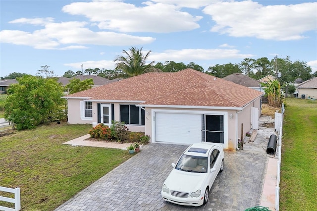 497 Lafayette St SW, Palm Bay, FL 32908 - single story home featuring stucco siding, an attached garage, driveway, and a shingled roof